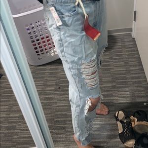 Gorgeous light wash jeans with tangling bling